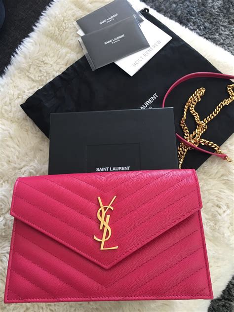 pink ysl wallet.